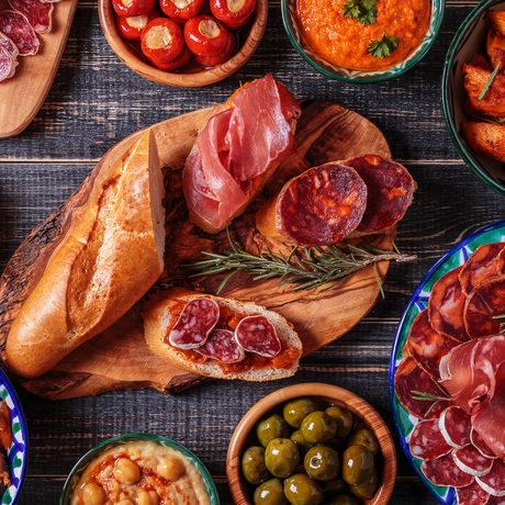 Charcuterie and cheese selection featuring Spanish cured meats