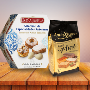 A box of Dona Jimena artisanal sweets and a bag of AntiuXona Mini Tortillas placed on a wooden table against a soft gradient background.